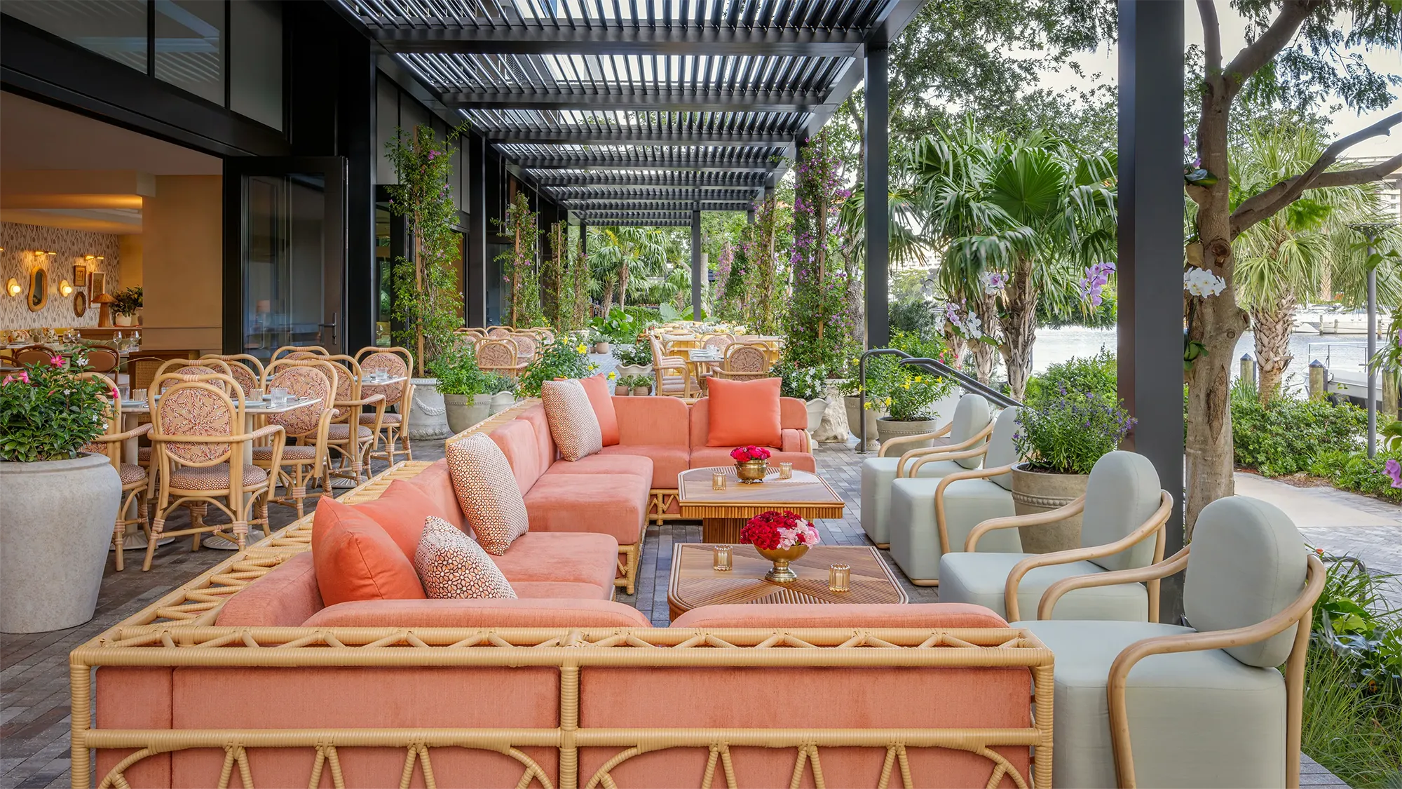 Outdoor couch and lounge seating next to a river in Miami Florida