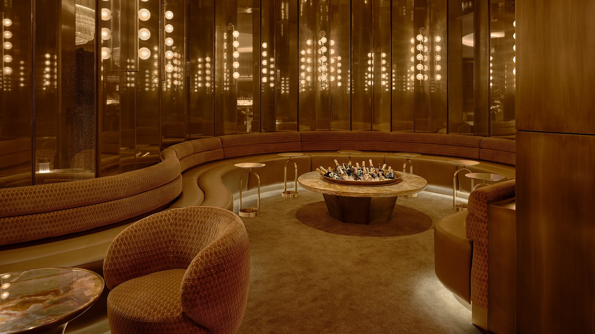 A psychedelic dining and lounging seating area in a half circle booth